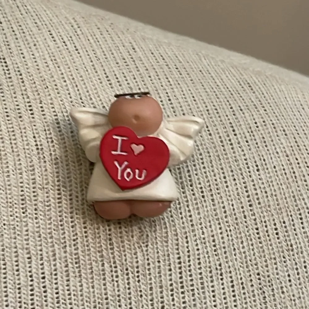 Kirk’s Angel Cheeks Angel Holding a Red Heart “ I ❤️ You”